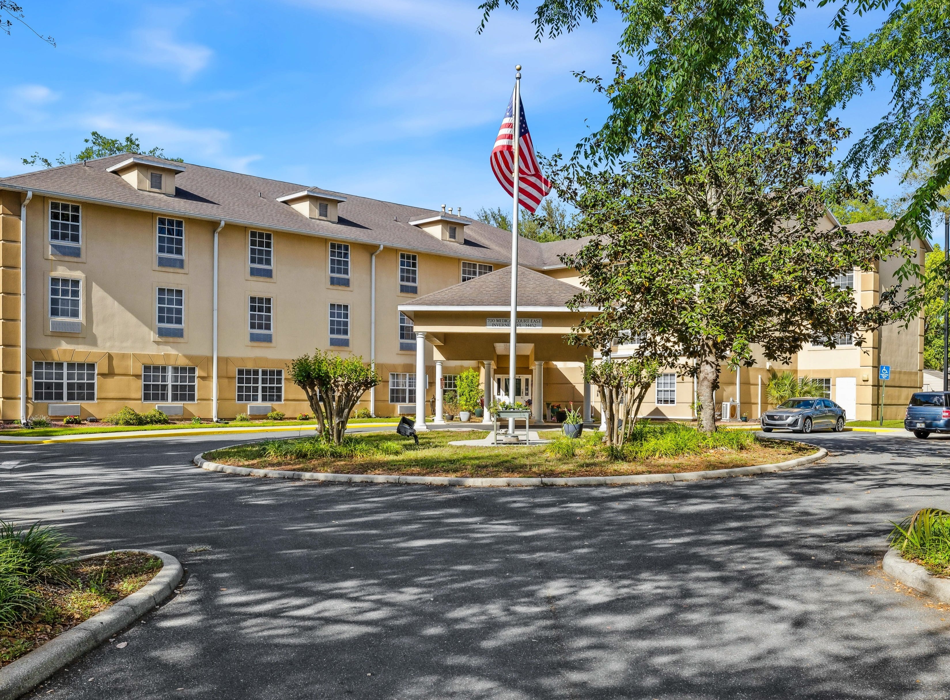 Highland Place front entrance with US flag